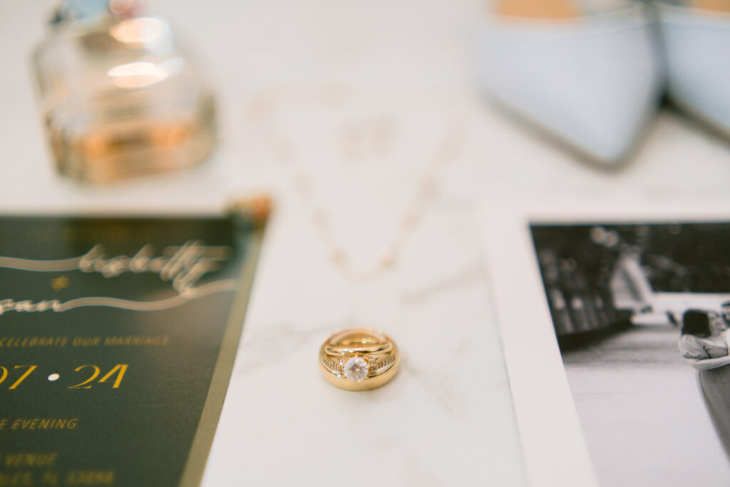 rings on plate photographed by orlando wedding photographer